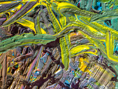abstract background of oil paints on a palette close-up macroの写真素材