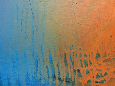 Painting close up texture background with blue, orange and red colorsの写真素材