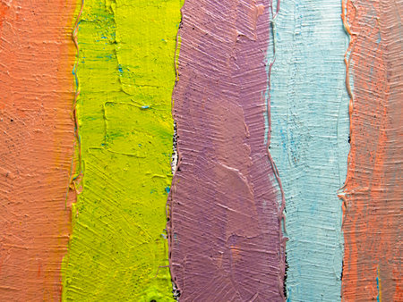 Painting closeup texture background with  blue, orange, yellow, green colorsの写真素材