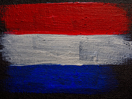 Netherlands flag painted on a wall with some soft highlights and foldsの写真素材