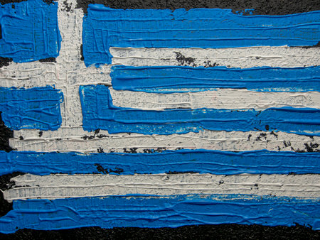 Grunge flag of Greece painted on a wall. Texture.の写真素材