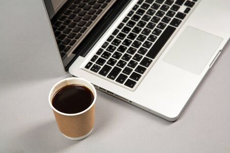 Office workplace table with supplies, smartphone and laptop. Flat lay. Top view with space for your textのeditorial素材