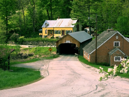 Little covered bridge on country roadの写真素材