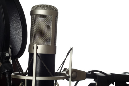 Studio microphone with pop filter close-up. Isolated on white background with copyspace.の写真素材