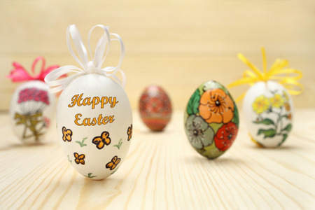 Easter eggs on wooden backgroundの写真素材