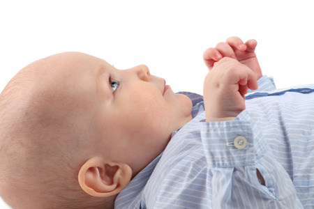 Portrait of a beautiful baby in profile.の写真素材