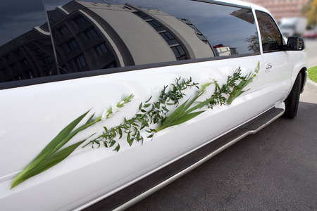 Luxury wedding car decorated with flowersの写真素材