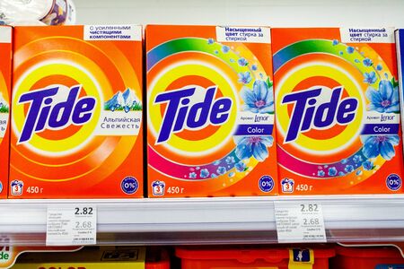 Minsk, Belarus, March 13, 2019: Washing Powder Tide on shelves in store