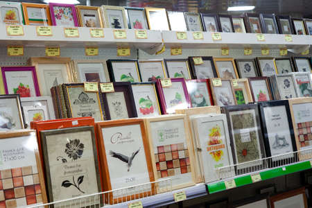 Large selection of photo frames in the store. Minsk, Belarus - March 20, 2020