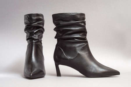 Women's boots with folds on the shaft, the effect of folded leather.の写真素材