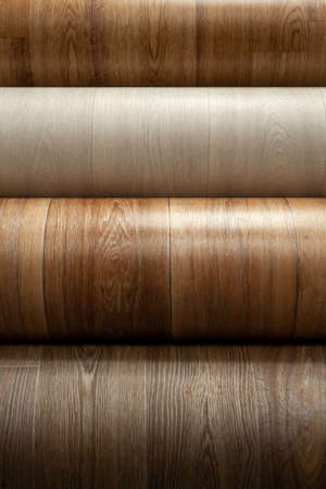Rolls of linoleum. Closeup of rolls of new linoleum on the window of a hardware store.の写真素材