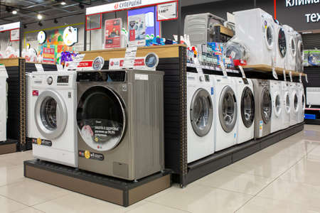 Washing machines displayed in the showroom of a commercial store. Minsk, Belarus - February, 2022のeditorial素材