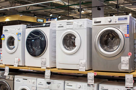 Washing machines displayed in the showroom of a commercial store. Minsk, Belarus - February, 2022のeditorial素材