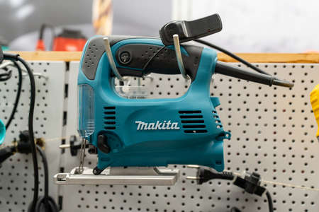 Jigsaw Makita for construction and repair on power tool store shelves. Minsk, Belarus - may 2022のeditorial素材