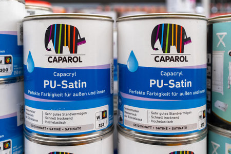Caparol brand paints on store shelves. Minsk, Belarus, 2022