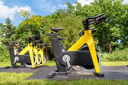 Outdoor gym with equipment. Outdoor Fitness Club with a range of exercise bikes. Healthy lifestyle...