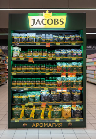 Jacobs coffee stand with company logo in a supermarket. Minsk, Belarus, 2022のeditorial素材