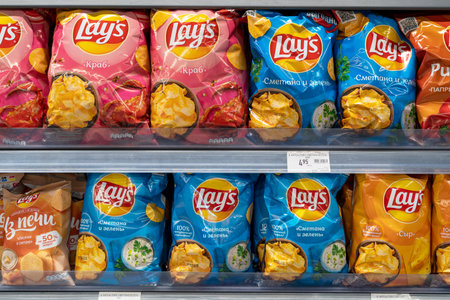 Various flavoured of Lay's Potato Chips on grocery store shelves. Minsk, Belarus, 2022のeditorial素材