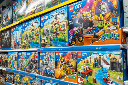Lego construction kits for sale in supermarket. Lego is a line of plastic construction toys that are manufactured by The Lego Group company in Denmark. Minsk, Belarus, 2022のeditorial素材