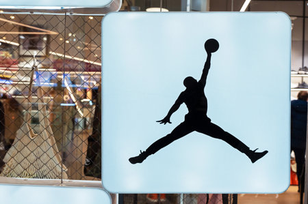 Air Jordan logo. Air Jordan neon store sign in shop window. Minsk, Belarus, 2023のeditorial素材