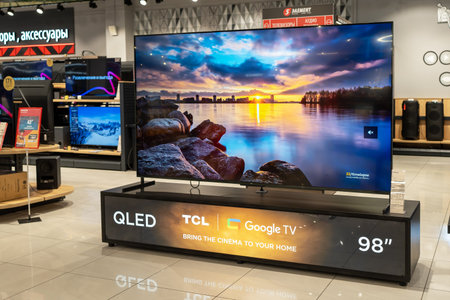 TV brand TCL, large size 98 inches sold in an electronics store. Minsk, Belarus, august 15, 2023のeditorial素材