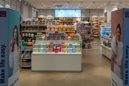 Miniso store interior. Modern stylish designer goods, accessories, toys on the shelves of the store....