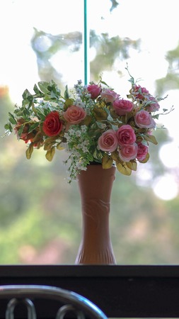 Beautiful bouquet of bright flowers in flowerpotの写真素材