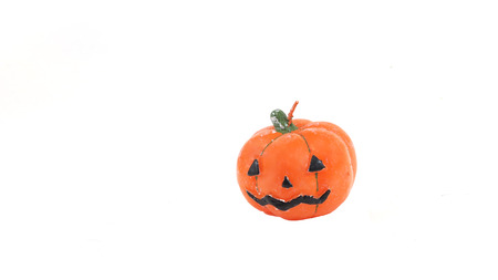 Scary Jack O'Lantern halloween pumpkin with candleの写真素材