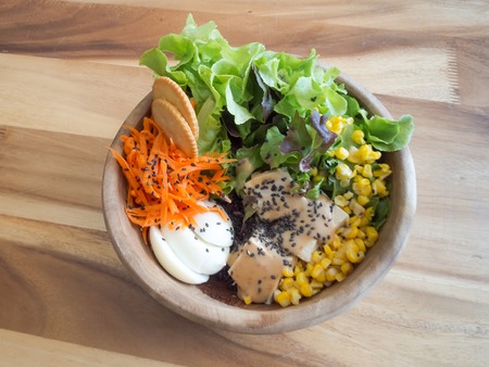Plate of fresh salad with boiled eggs, corn poppy.の写真素材