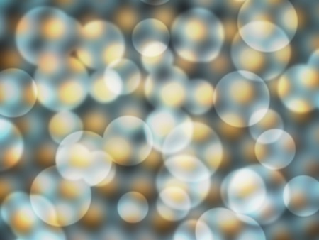 bokeh lights on golden colored backgroundの写真素材