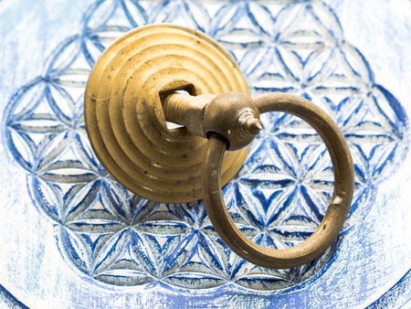 brass ornamental door knocker for  wood door.の写真素材