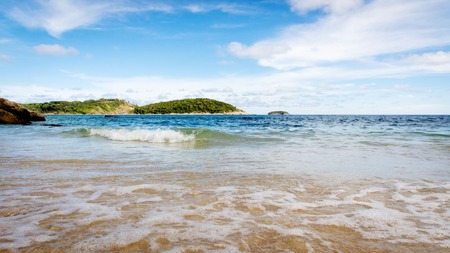 AoSaneBeach is a small bay next to Nai Harn right. Through the Phuket Yacht Club. A quiet little beach with rocky and sandy beaches the beautiful very clean PhuketThailandの写真素材