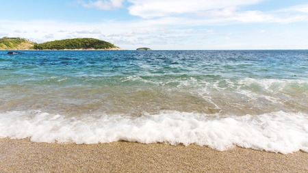 AoSaneBeach is a small bay next to Nai Harn right. Through the Phuket Yacht Club. A quiet little beach with rocky and sandy beaches the beautiful very clean PhuketThailandの写真素材