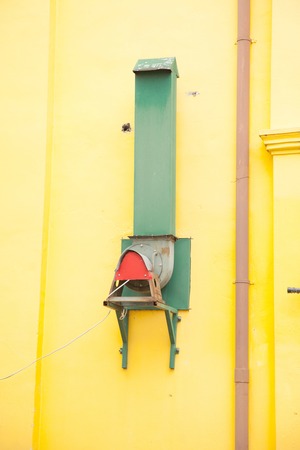 Smoke emerging from green chimneyの写真素材