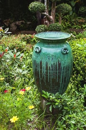 A closeup of a vase sculpture garden decorの写真素材