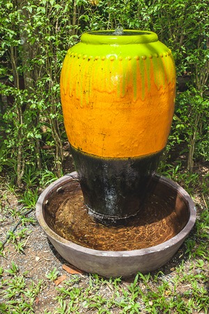 A closeup of a vase sculpture garden decorの写真素材