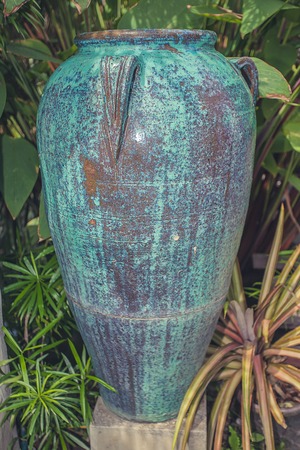 A closeup of a vase sculpture garden decorの写真素材