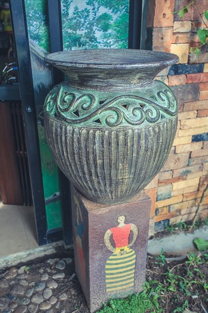 A closeup of a vase sculpture garden decorの写真素材