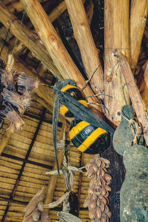 A wood honey beel as decoration in the gardenの写真素材
