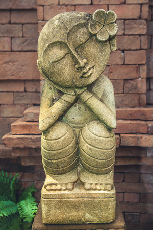 A closeup of a statue sculpture garden decorの写真素材