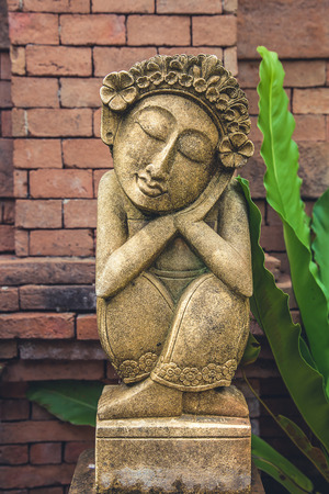 A closeup of a statue sculpture garden decorの写真素材