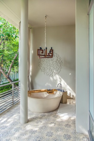 A beautiful bath tub front porch.の写真素材