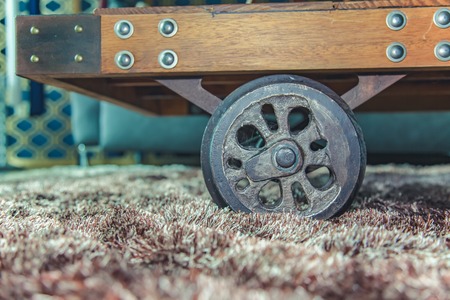 Old Locomotive wheel to modify the living room furniture.の写真素材
