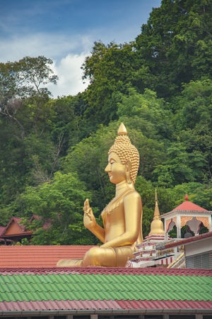 Buddha gold statue of Wat Kao Rang Phuket Thailandの写真素材