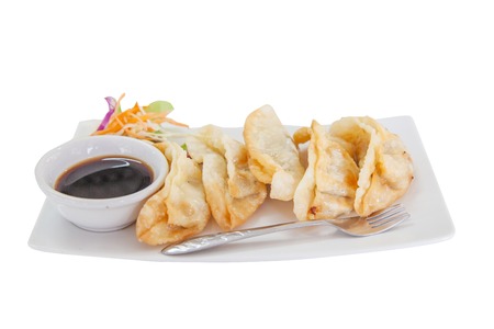 Dumplings on a white dish.の写真素材