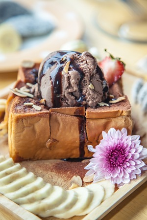 Ice cream chocolate honey toast with bananasの写真素材