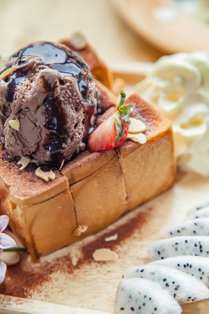 Ice cream chocolate honey toast with bananasの写真素材