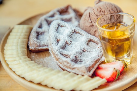 Waffle and chocolate  ice cream with bananasの写真素材