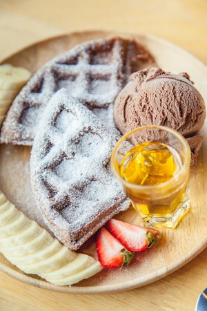 Waffle and chocolate  ice cream with bananasの写真素材