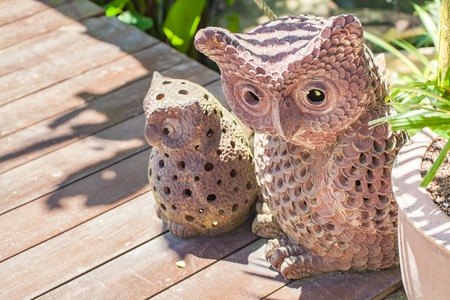 Owl ornament in the gardenの写真素材